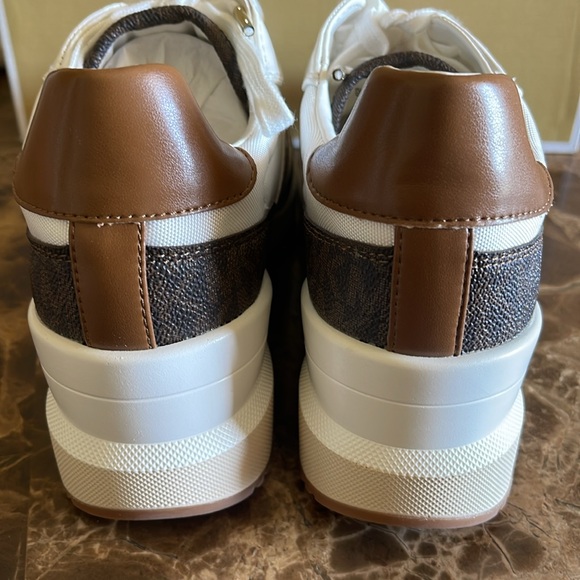 Michael Kors Women's Mabel trainer lace-up Sneakers, 2" heel;
3/4 platform - Picture 7 of 11